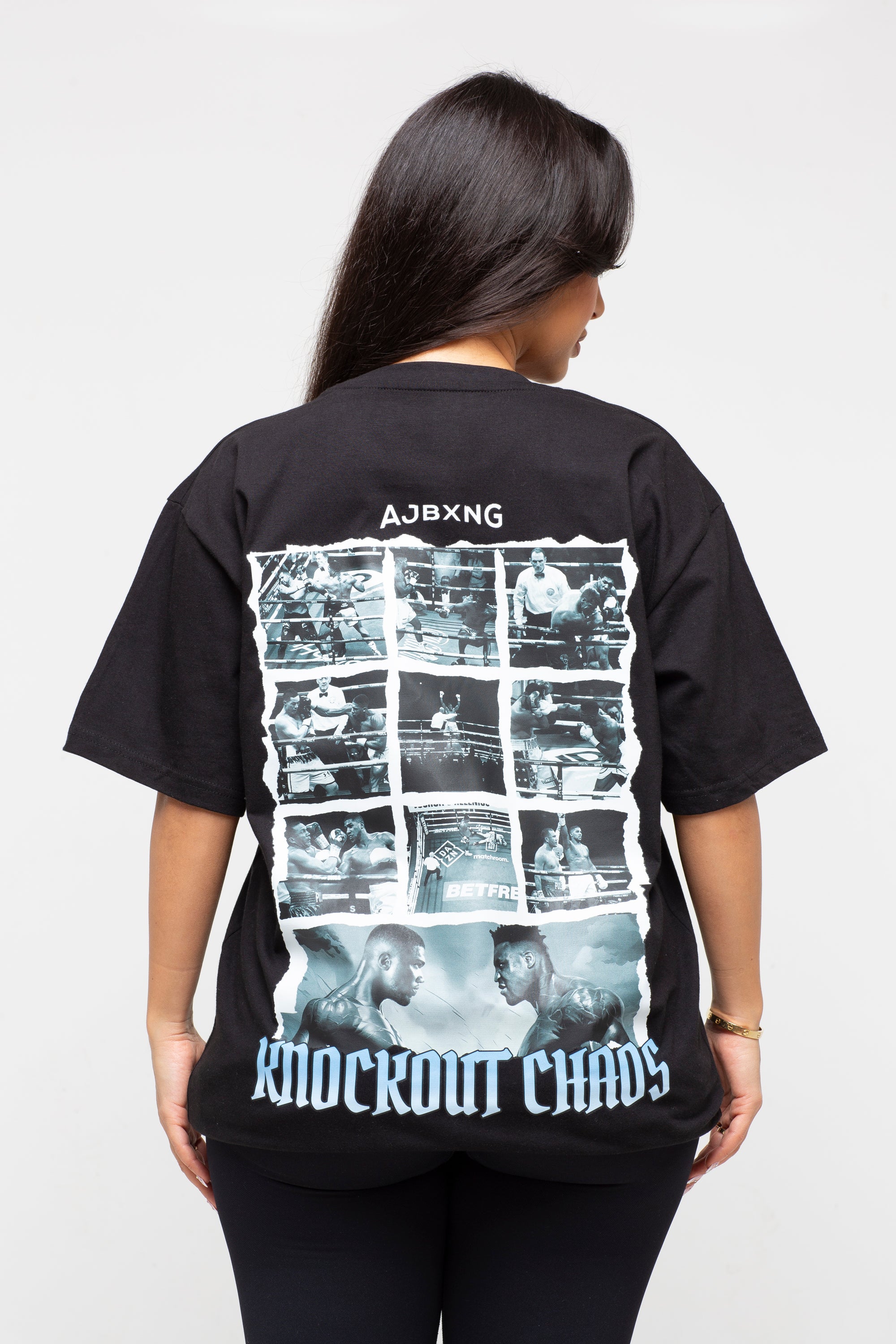 The Official AJBXNG Anthony Joshua Vs Ngannou  Fight Night, Black Tee/Blue Text Knockout Chaos'